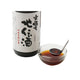 Japansk Izumo Jidenshu madlavningssake i en lille skål – den smukke klare, gyldne farve fremhæver den rene kvalitet, den fyldige umami og den autentiske japanske sake, perfekt til klassisk japansk madlavning.