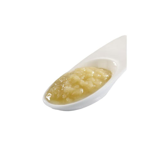 Shio Koji pasta på en lille ske – den lyse, cremede pasta med synlige koji-riskorn fremhæver den naturlige fermentering, den fyldige umami og den autentiske japanske kvalitet, perfekt til marinader og smagsforstærkning.