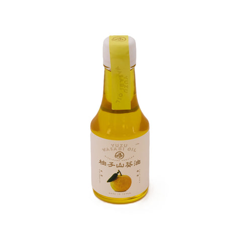 Yuzu wasabi olie 140 g i original japansk glasflaske – autentisk japansk gourmetolie med frisk yuzu, ægte Hon Wasabi og risolie, fyldig umami samt en elegant balance mellem citrus og wasabi i premium kvalitet.