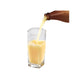Yuzujuice serveret i et glas – den smukke gyldne farve fremhæver den friske japanske kvalitet.