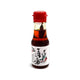 Sesamolie med chili i original japansk glasflaske – autentisk japansk premium sesamolie med chili, fyldig umami, intens nøddeagtig aroma og en perfekt afbalanceret varme til ramen, dumplings, wokretter og autentisk japansk madlavning.