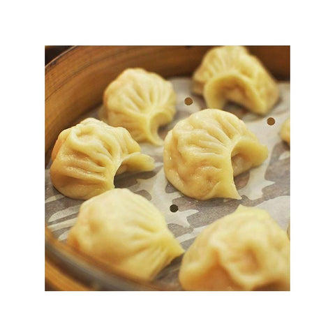Dumplings med papir til bambus damper 